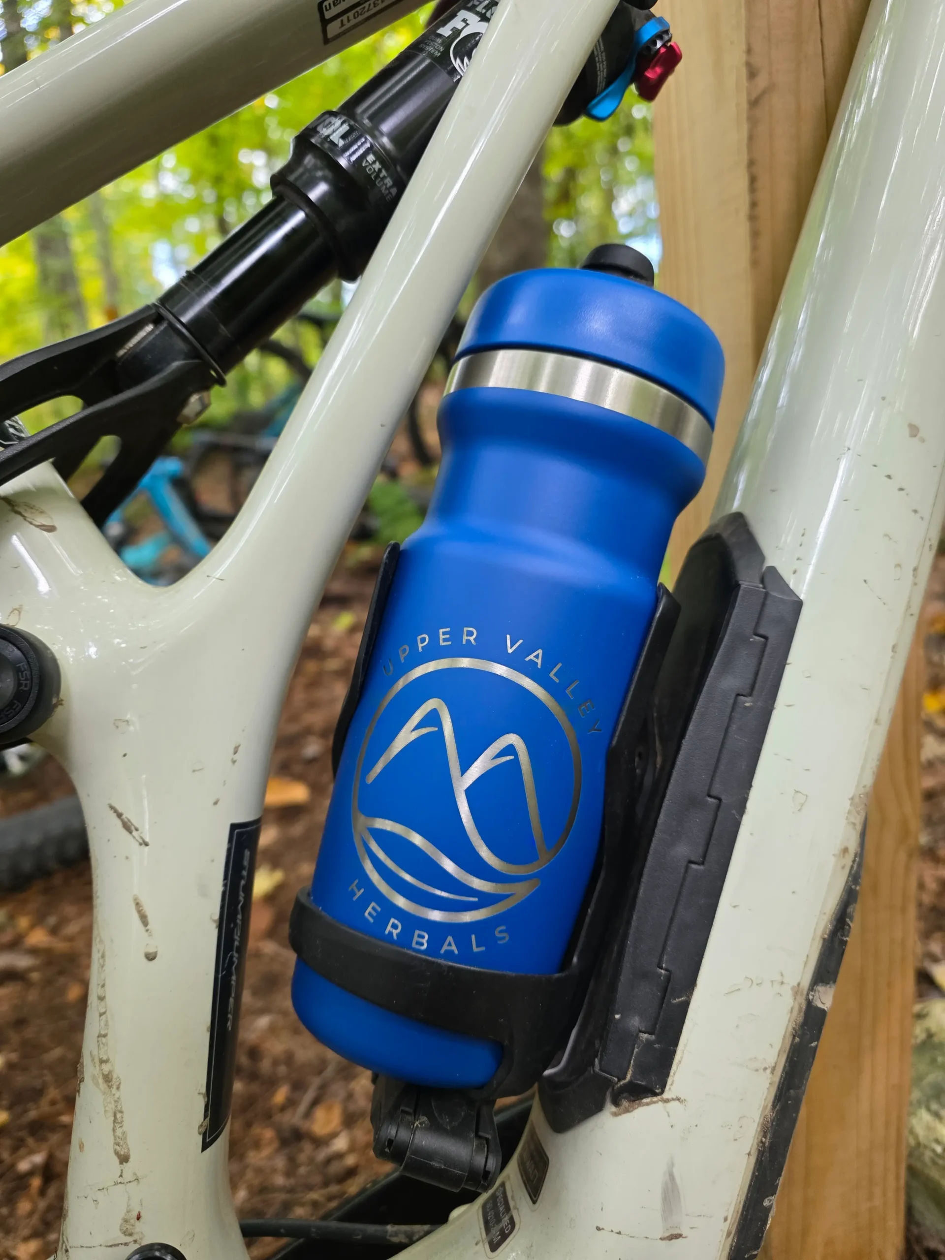 waterbottle displayed in a mountain bike waterbottle cage